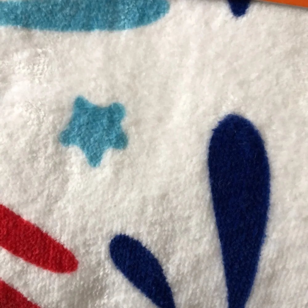 White Beach Towel with Red, Blue and Light Blue Starburst Print